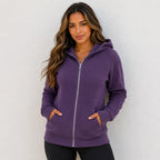 Women's purple hooded fleece-lined zip-up sweatshirt with front pockets