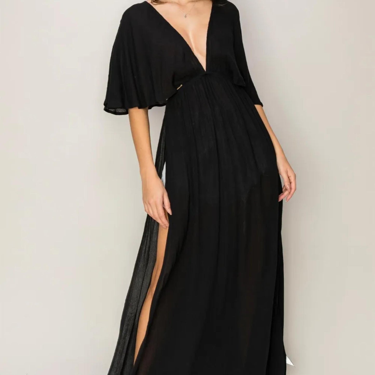 Front view of the HYFVE Black tie back maxi split cover up dress.