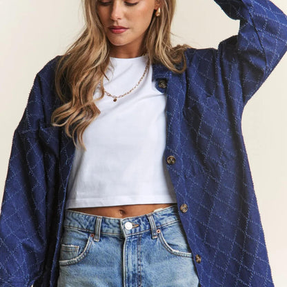 Detailed view of the button-up front and collar on the J.NNA Dark Denim shacket.