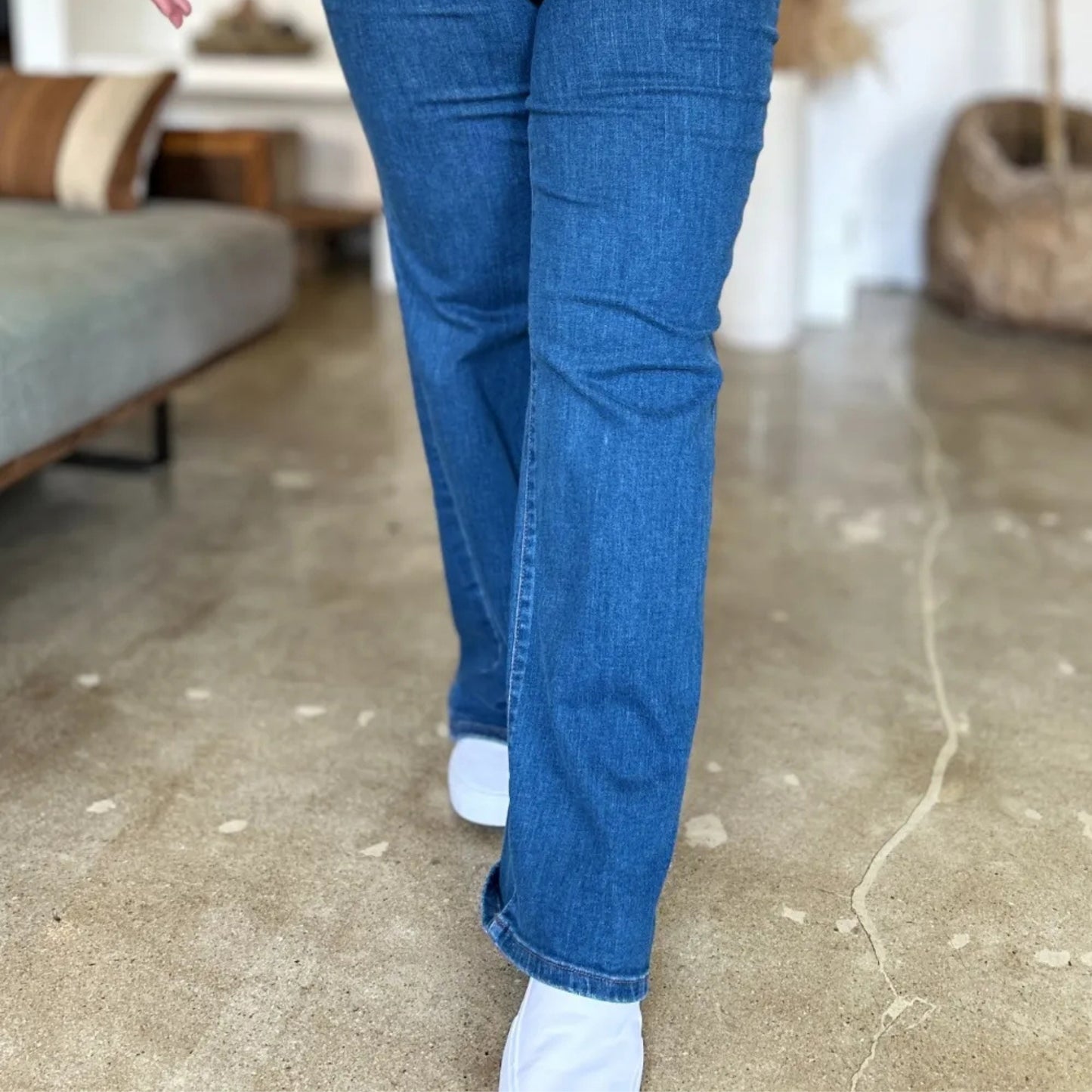 Full view of the Judy Blue high-rise straight jeans in a lifestyle setting.