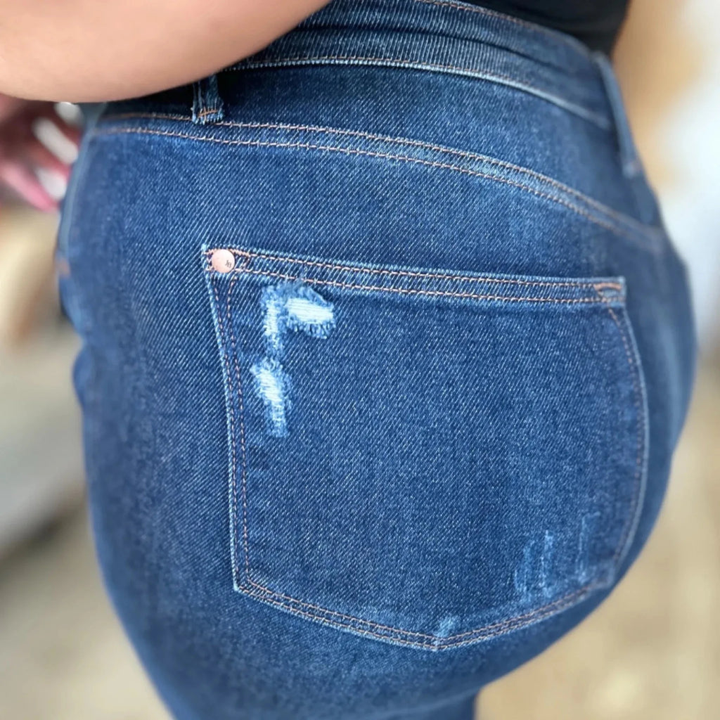 Close-up back pocket detail of Judy Blue High Waist Rigid Magic Heavy Destroy Straight Jeans on a plus-size model featuring premium denim, signature stitching, and distressed accents.
