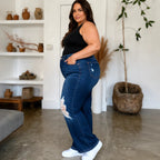 Plus-size model wearing Judy Blue High Waist Rigid Magic Heavy Destroy Straight Jeans side view showcasing the flattering high-rise waist, straight-leg fit, and premium dark wash denim.