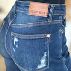 Close-up back pocket detail of Judy Blue High Waist Rigid Magic Heavy Destroy Straight Jeans featuring signature stitching, premium denim, and distressed accents.