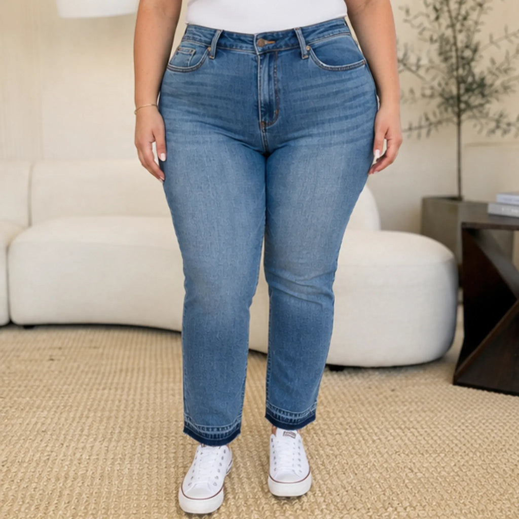 Full-length front view of Judy Blue Full Size Mid Rise Rigid Magic Release Hem Jeans with a flattering straight-leg silhouette and release hem.