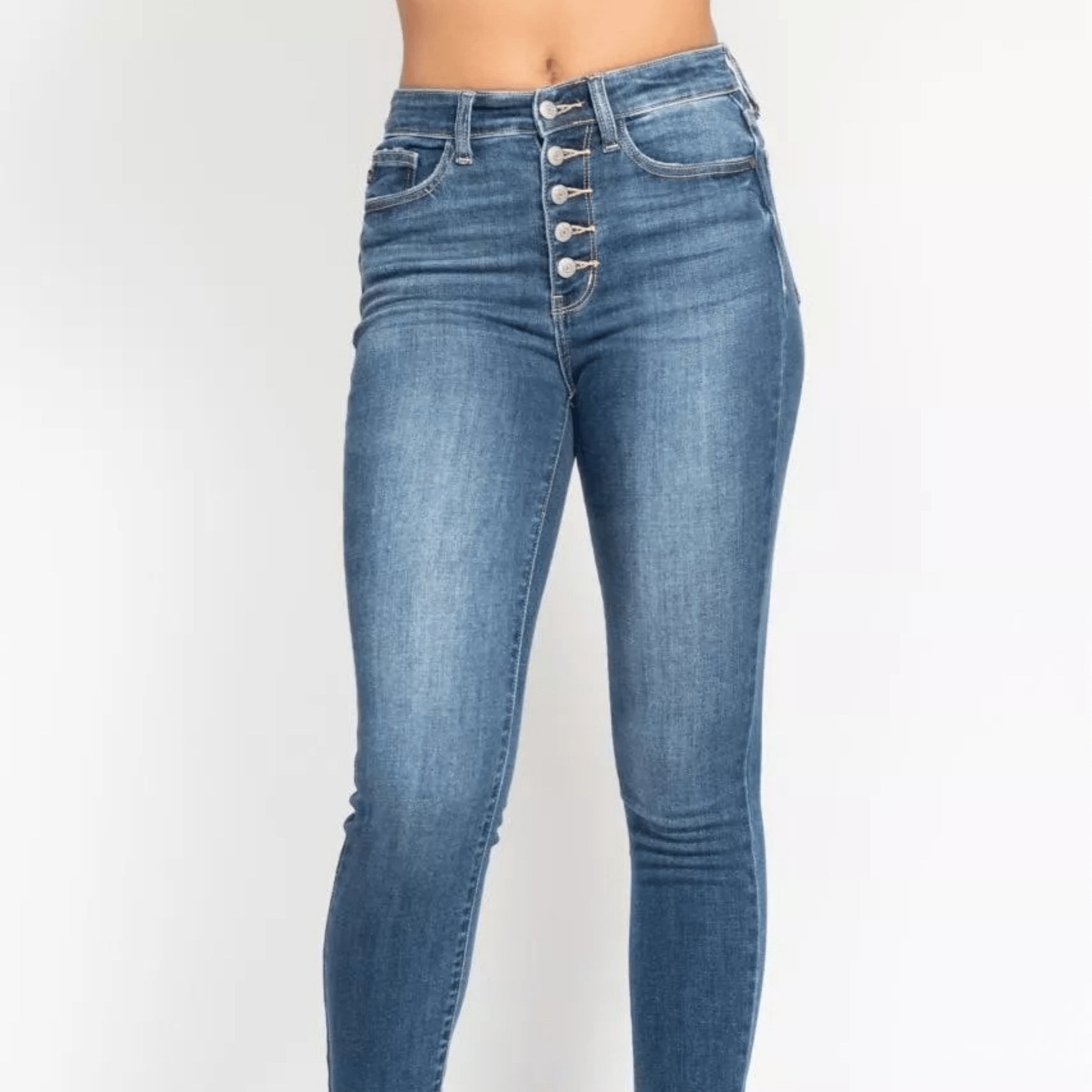 Front view of Judy Blue high-rise button-fly skinny jeans in medium wash.
