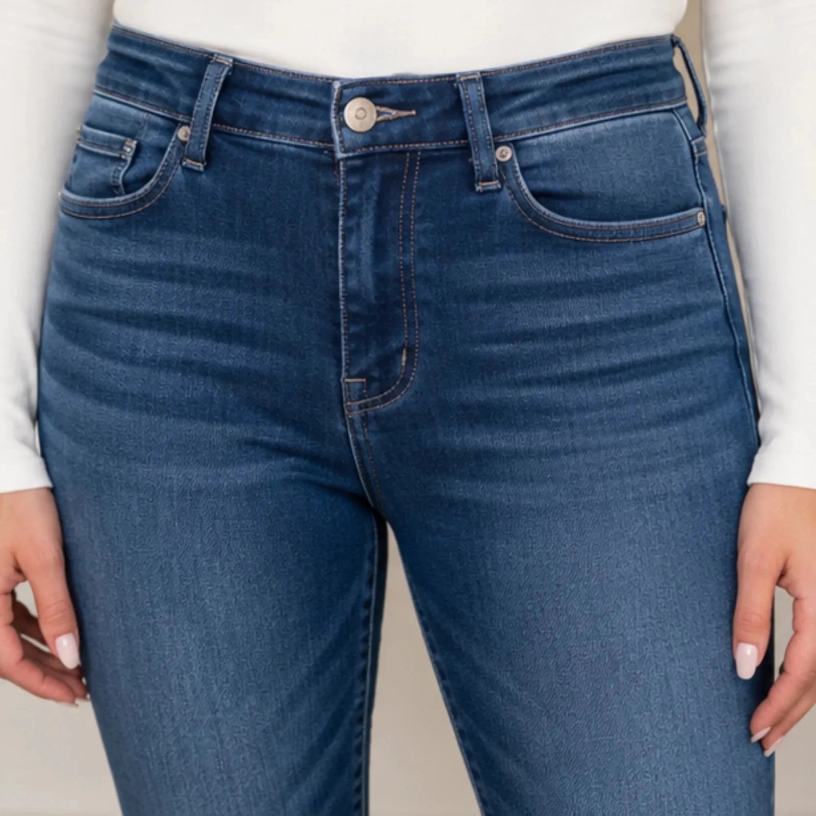 Close-up of Judy Blue Full Size Washed Thermal Skinny Jeans highlighting premium stretch denim, high-rise waistband, contrast stitching, and thermal-lined fabric.