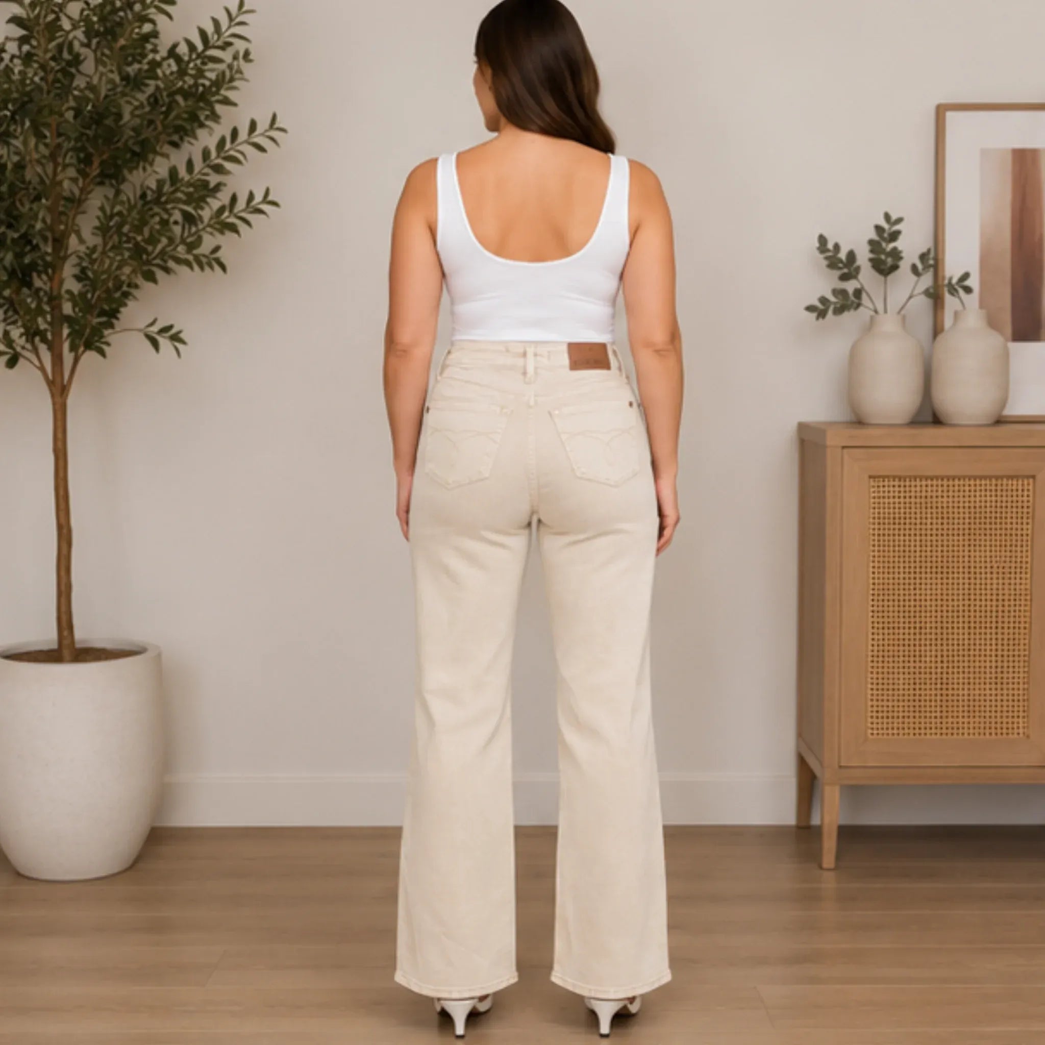 Women's Judy Blue High Waist Distressed Wide Leg Jeans in ivory back view featuring signature Judy Blue back pockets, high-rise waist, wide-leg fit, and premium stretch denim.