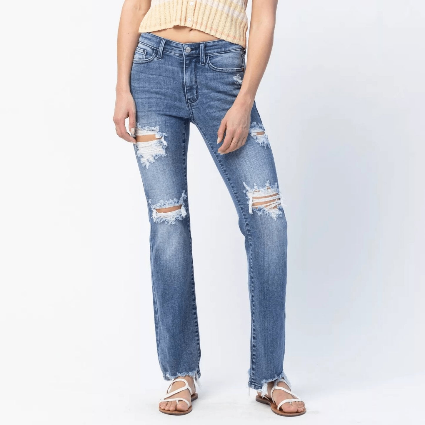 Front view of Judy Blue mid-rise destroyed straight leg jeans on a white background.