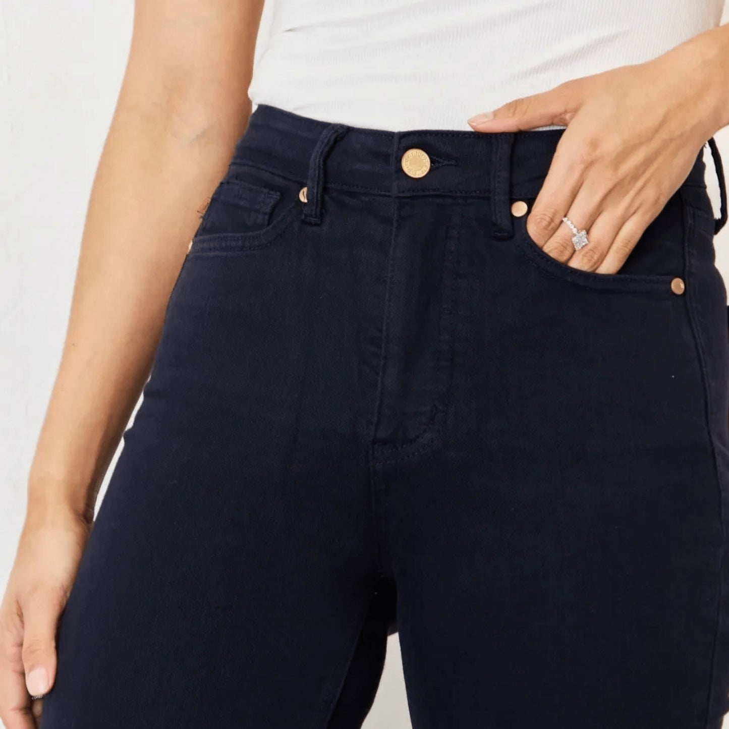 Detailed view of the navy garment dyed denim fabric.