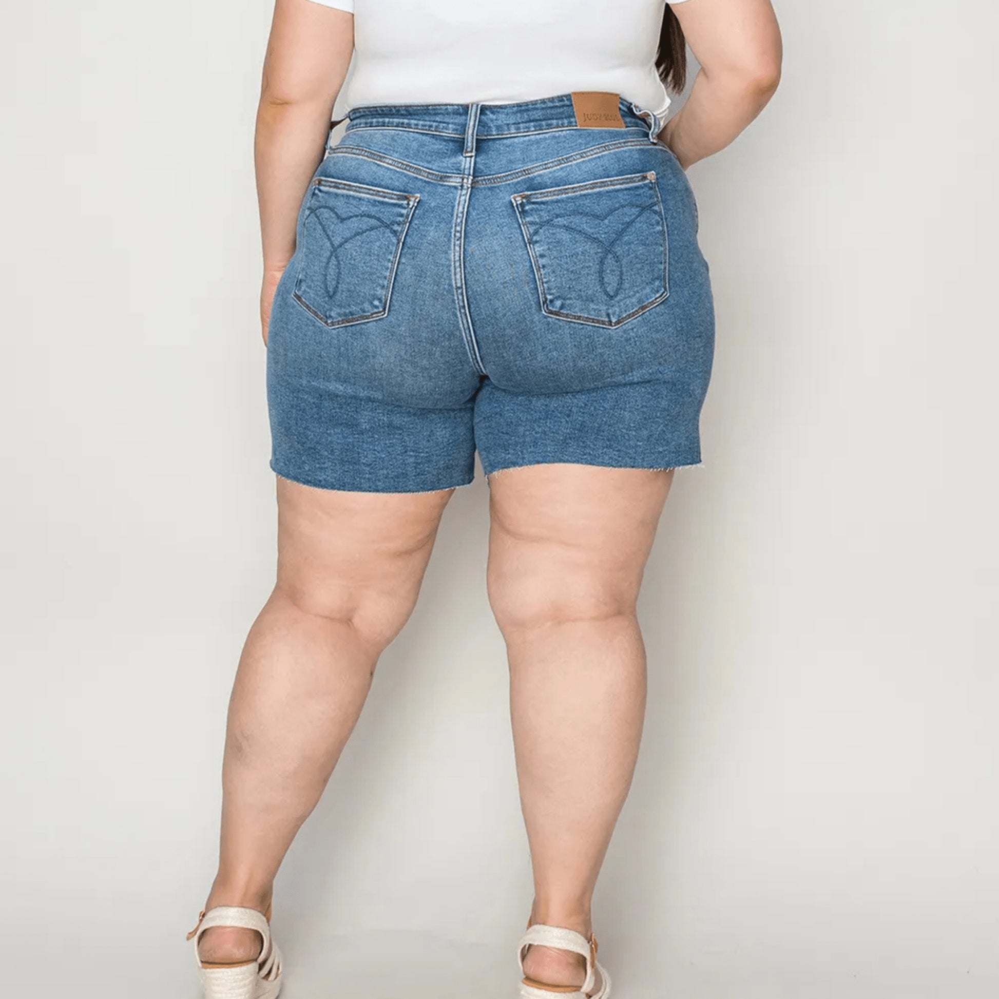 Back view of Judy Blue denim shorts showing pocket detail.