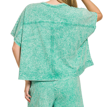 Detailed view of the vintage snow-wash finish and pocket on the green Zenana set.