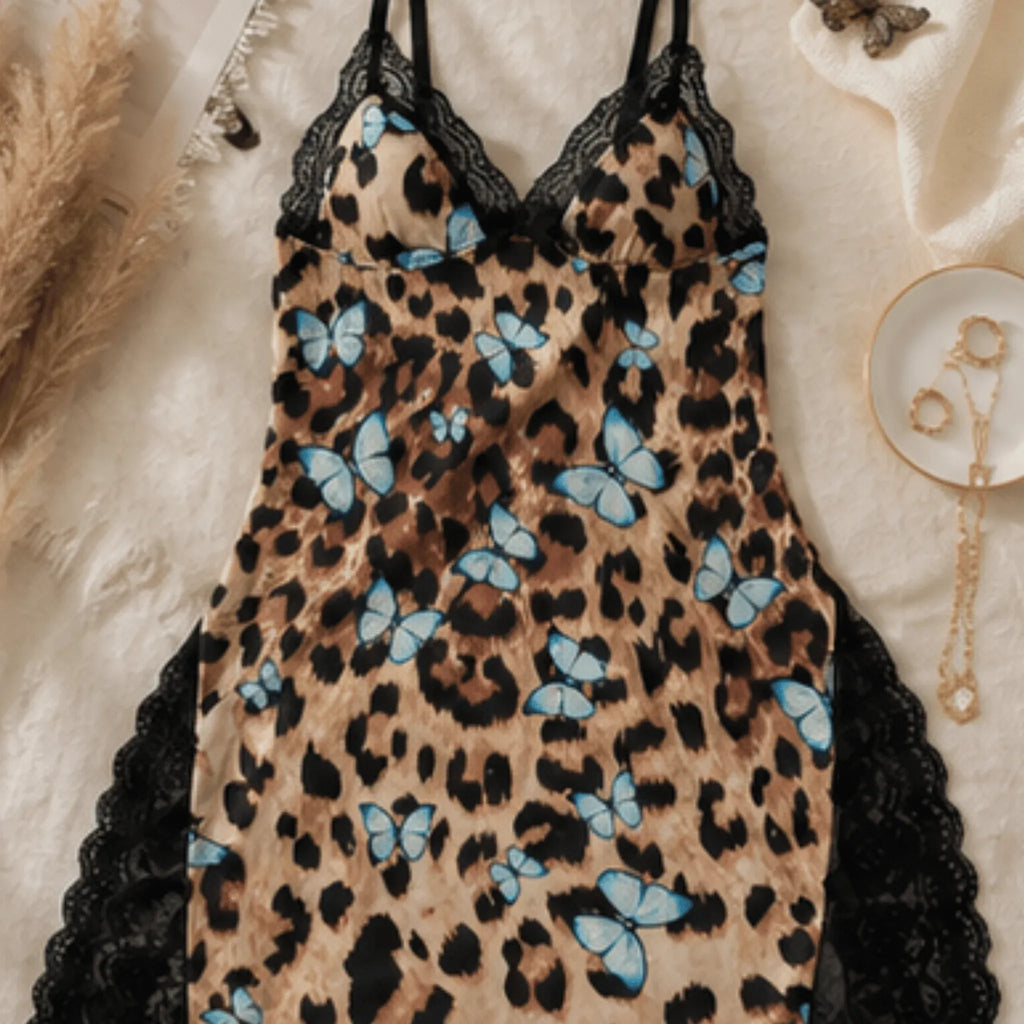 Women's leopard butterfly print lace trim split hem chemise with unique print and lace trim.