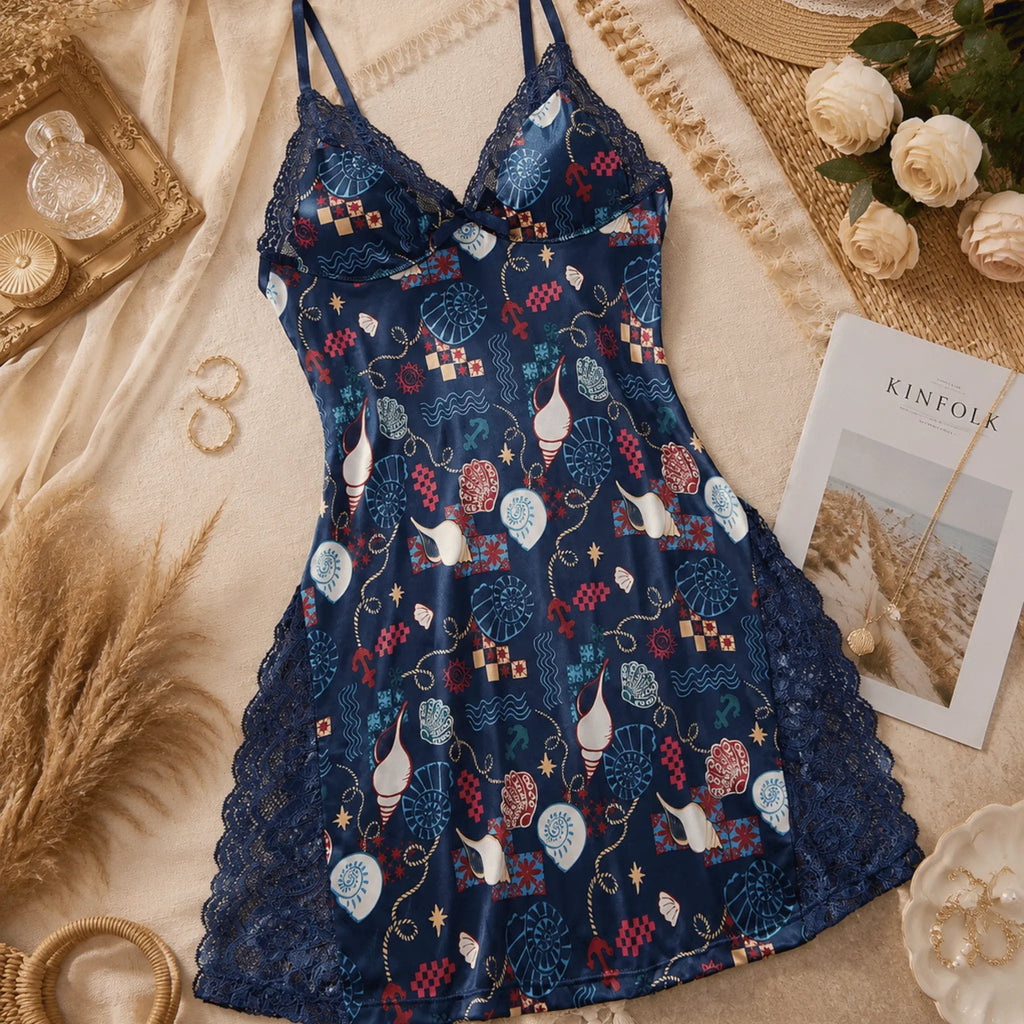 Women's seashell lace trim split hem chemise with a soft neutral tone and elegant lace details.