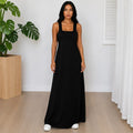 Woman wearing the Layered Sleeveless Maxi Dress Set in black featuring a casual sleeveless layered maxi dress design.