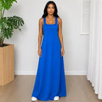 Woman wearing the Layered Sleeveless Maxi Dress Set in royal blue with a relaxed fit and elegant maxi length.