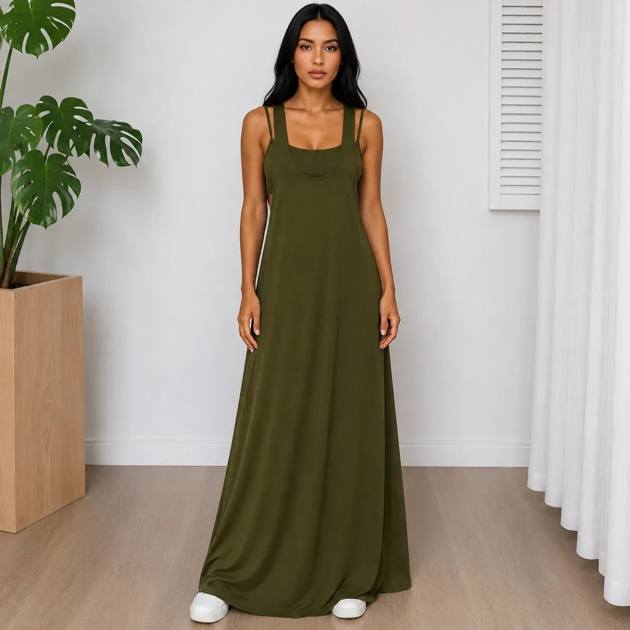 Woman wearing the Layered Sleeveless Maxi Dress Set in military green featuring a soft, flowy sleeveless maxi dress.