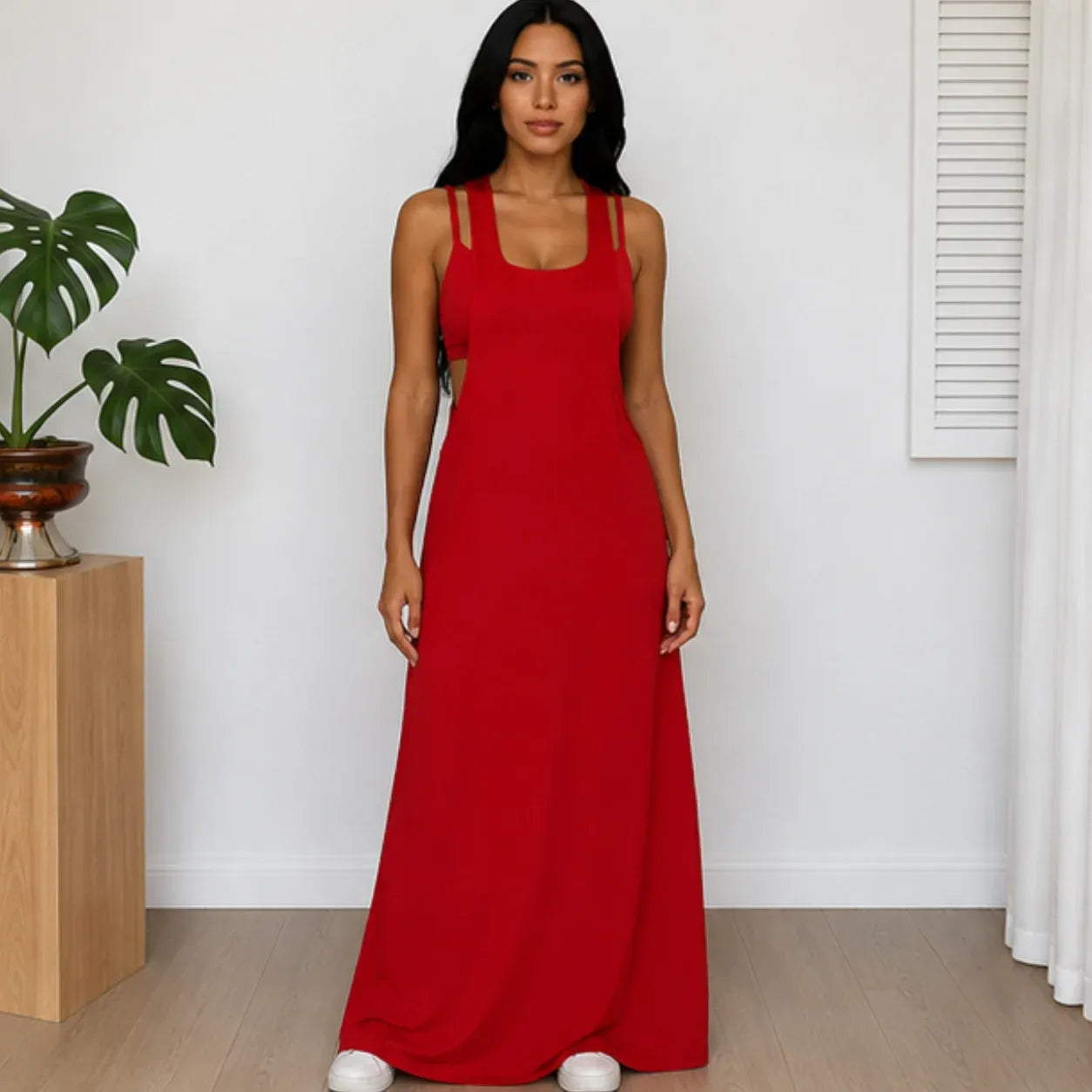 Woman wearing the Layered Sleeveless Maxi Dress Set in red featuring a relaxed fit, sleeveless design, and flowing maxi dress front view.