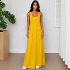 Woman wearing the Layered Sleeveless Maxi Dress Set in yellow with a comfortable relaxed fit and flowing silhouette.