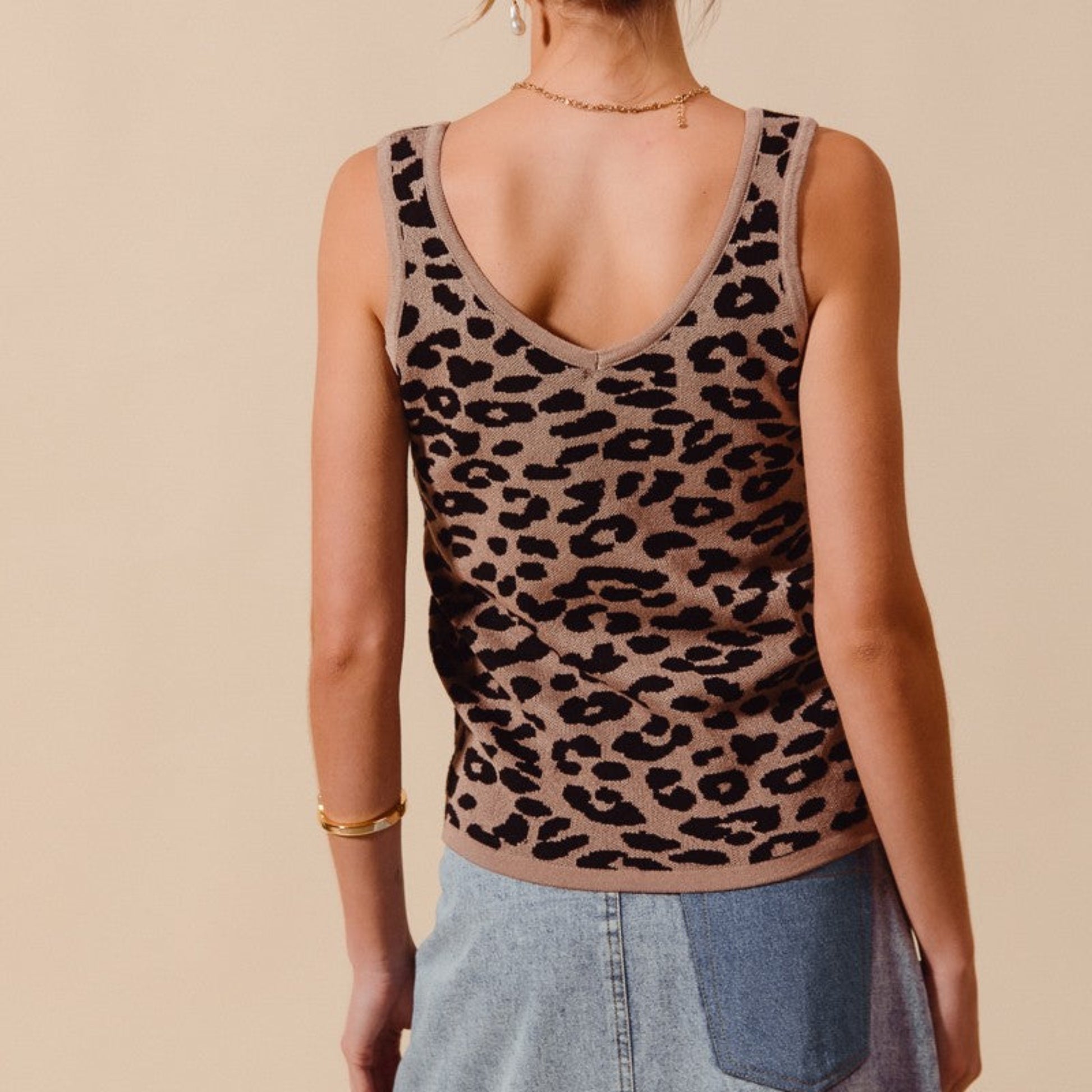Back view of the leopard knitted lightweight v-neck tank top showing the full animal print pattern