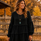 Women's Literary Retro Geometric Long Sleeve Top in Black, front view featuring textured geometric fabric and a relaxed tiered silhouette.