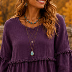 Close-up of the Purple Literary Retro Geometric Long Sleeve Top featuring the textured geometric fabric and ruffle trim.