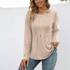 Women's beige long sleeve crew neck essential top with pleated detailing and a soft, relaxed everyday fit.
