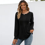 Women's black long sleeve crew neck essential top featuring pleated front accents and a flattering relaxed silhouette.