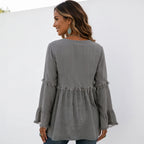 Back view of women's gray long sleeve lace trim top with lace trim yoke, flowy fit, and long bell sleeves.