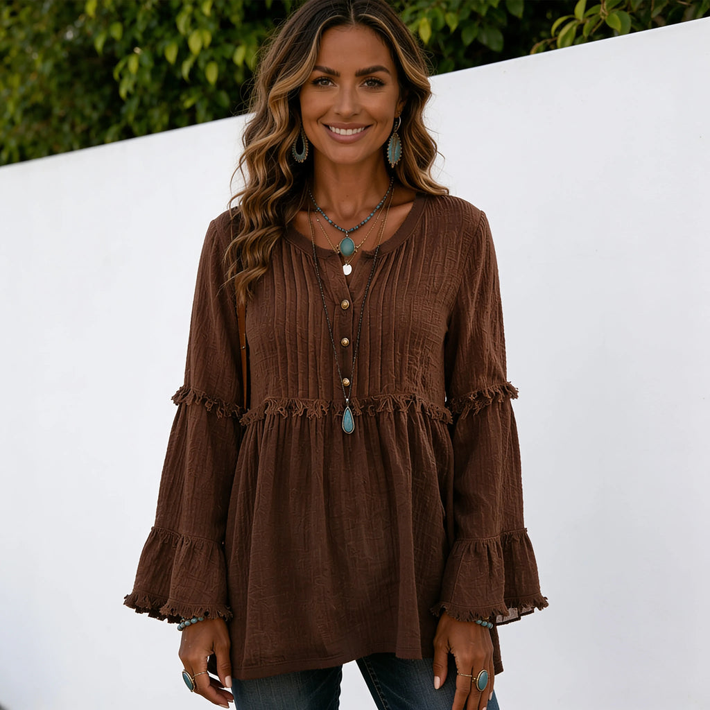 Women's coffee brown long sleeve lace trim top featuring a pleated front, lace trim accents, decorative buttons, and a loose, flowy silhouette.