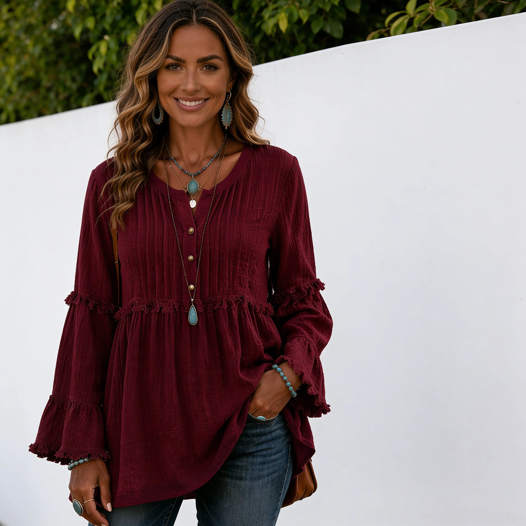 Women's wine red long sleeve lace trim top with textured fabric, lace trim detailing, decorative buttons, and relaxed fit.