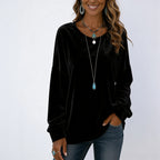 Women's black long sleeve velvet solid color top with a classic crew neckline and relaxed everyday fit.