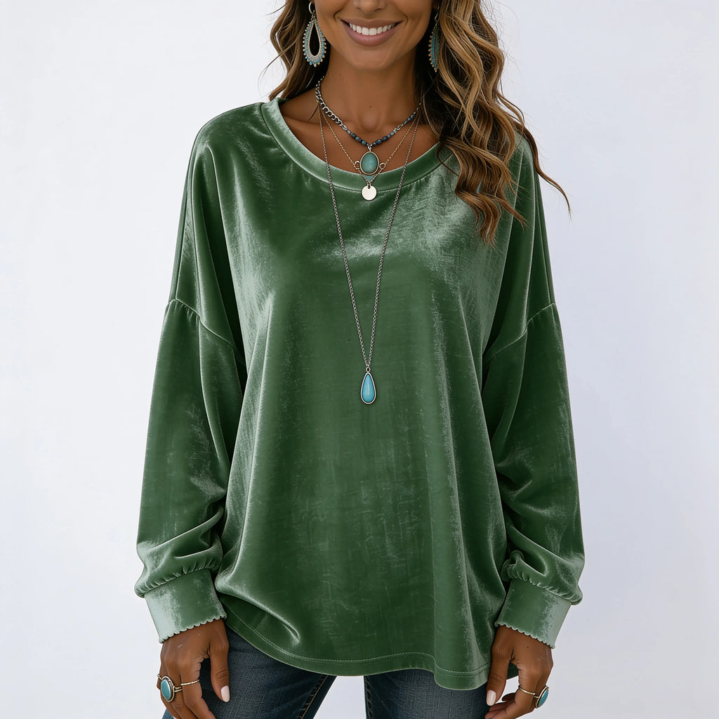 Women's green long sleeve velvet solid color top featuring a relaxed oversized fit and soft velvet fabric.