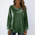 Women's green long sleeve velvet solid color top featuring a relaxed oversized fit and soft velvet fabric.