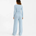 Women's light blue long-sleeve top and wide-leg pants two-piece set back view