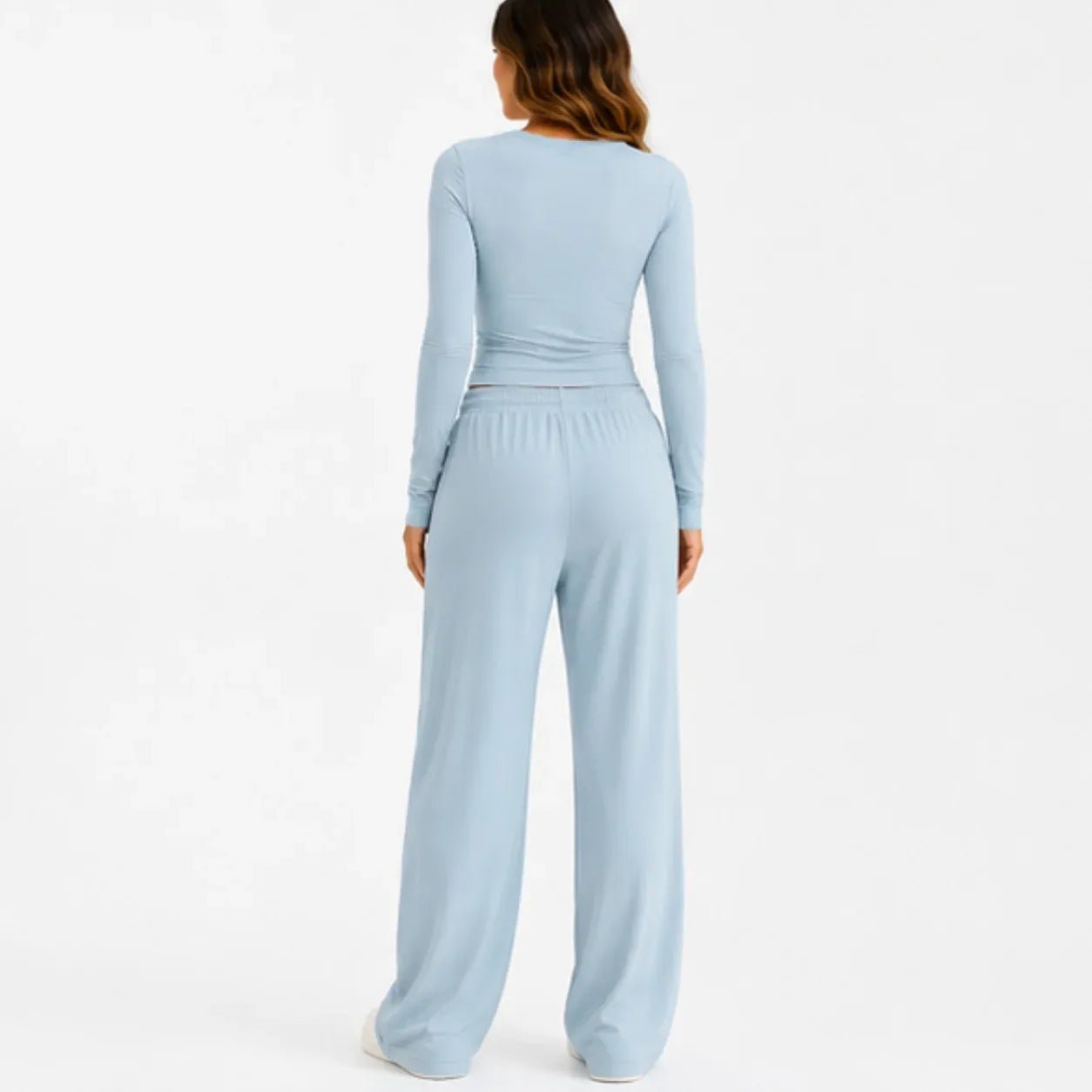 Women's light blue long-sleeve top and wide-leg pants two-piece set back view