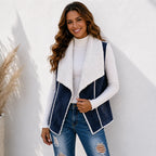 Navy blue faux suede sherpa-lined vest with soft sherpa trim, front view