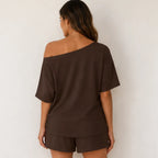 Back view of the Off-Shoulder Lounge Top & Shorts 2-Piece Set in brown showing the relaxed oversized silhouette.