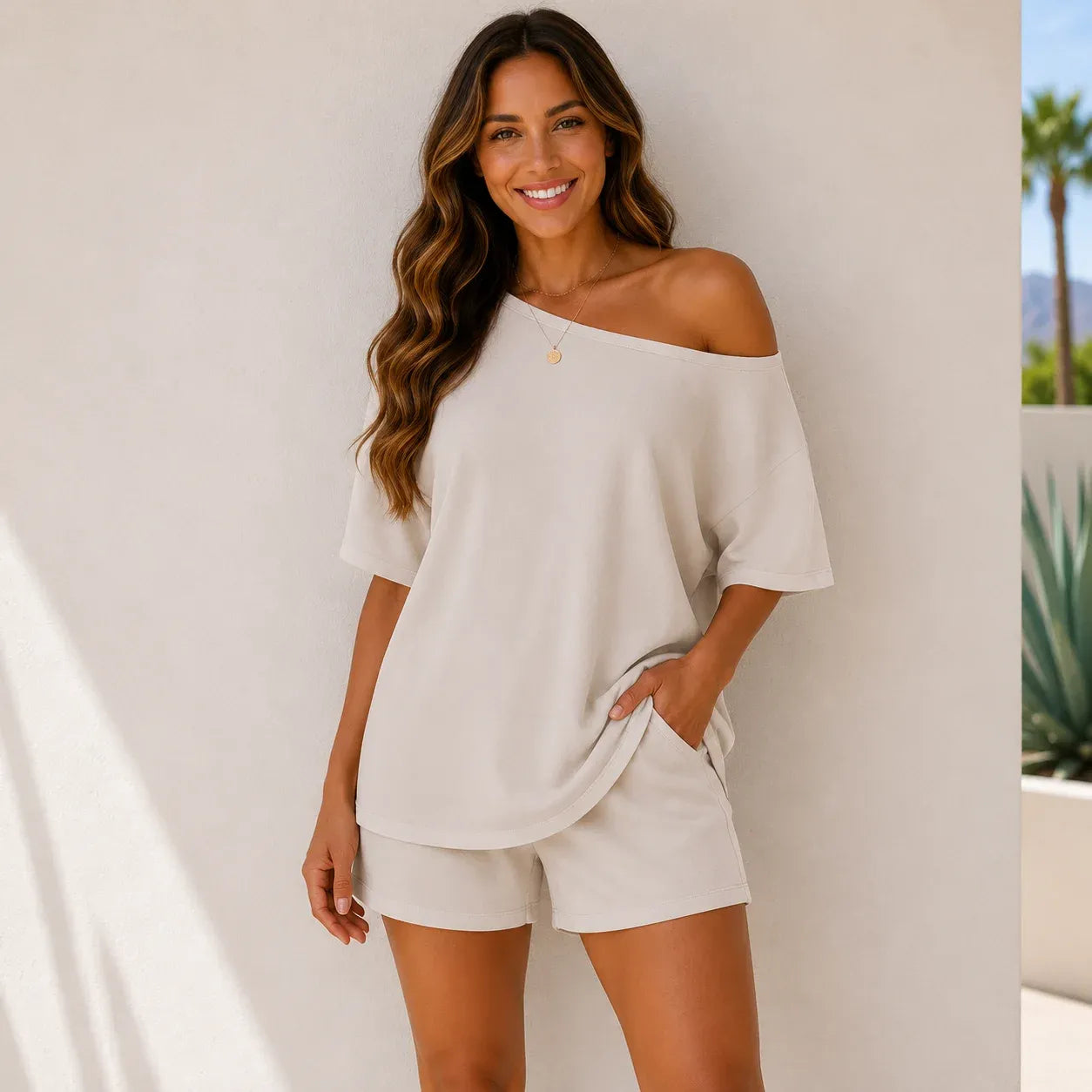 Woman wearing the Off-Shoulder Lounge Top & Shorts 2-Piece Set in khaki with a relaxed off-the-shoulder design.