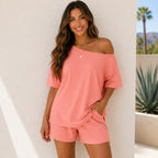 Woman wearing the Off-Shoulder Lounge Top & Shorts 2-Piece Set in rose red with a relaxed oversized silhouette.