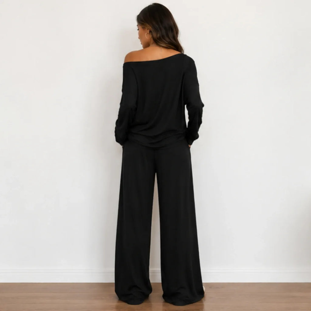 Back view of black off-shoulder long-sleeve wide-leg pants set
