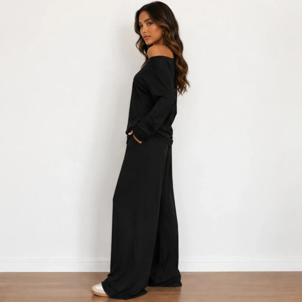 Side view of black off-shoulder long-sleeve wide-leg pants set