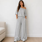 Women's Off-the-Shoulder Wide-Leg Matching Set in light gray featuring a relaxed off-the-shoulder top and wide-leg lounge pants.