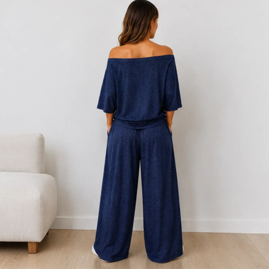 Back view of the Women's Off-the-Shoulder Wide-Leg Matching Set in navy blue featuring the off-the-shoulder design and relaxed fit.