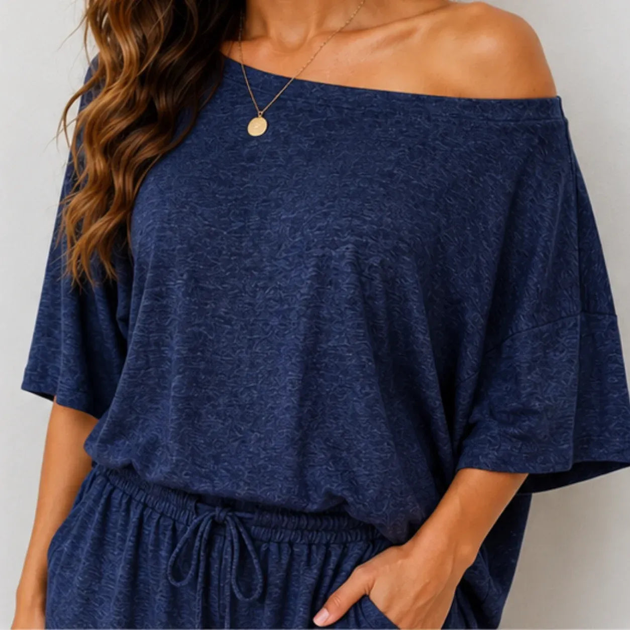 Close-up of the Off-the-Shoulder Wide-Leg Matching Set in navy blue featuring the off-the-shoulder neckline and soft fabric details.