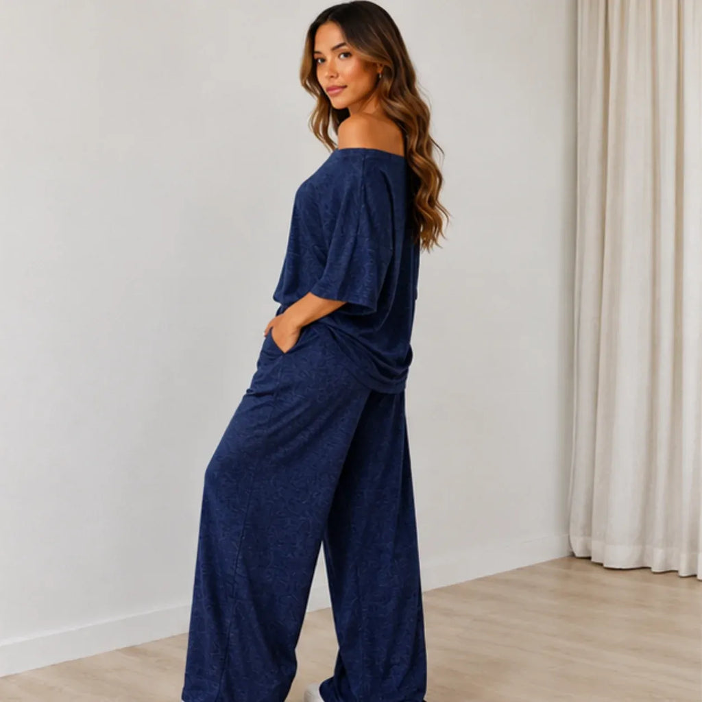Side view of the Women's Off-the-Shoulder Wide-Leg Matching Set in navy blue showcasing the relaxed silhouette and flowing wide-leg pants.