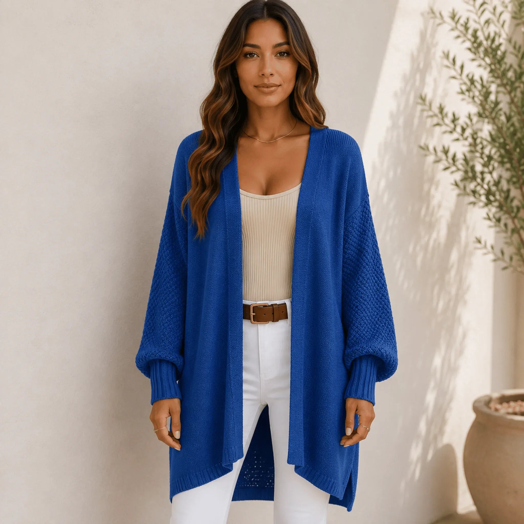 Women's royal blue oversized open front long cardigan with textured sleeves, soft chenille knit, and an open front design.