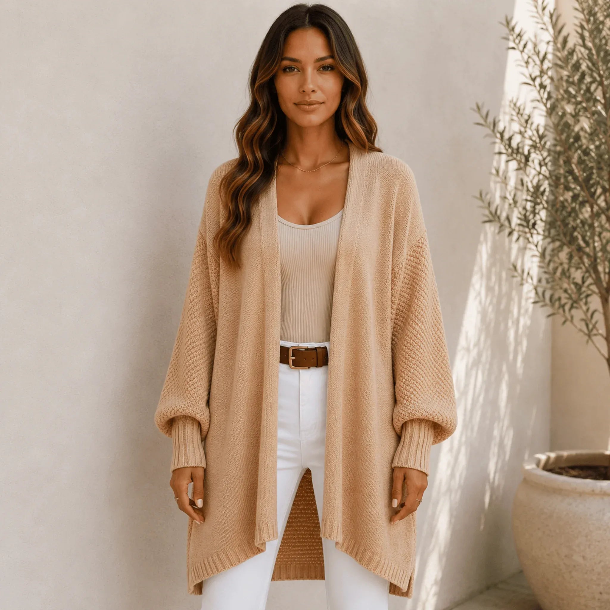 Women's camel oversized open front long cardigan with textured balloon sleeves, ribbed cuffs, and a cozy longline silhouette.