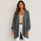 Women's gray oversized open front long cardigan featuring a relaxed oversized fit, soft chenille knit, and textured sleeves.