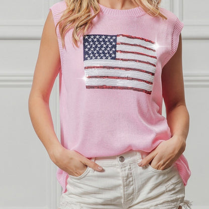 Person wearing a pink sleeveless top with an American flag design against a neutral background