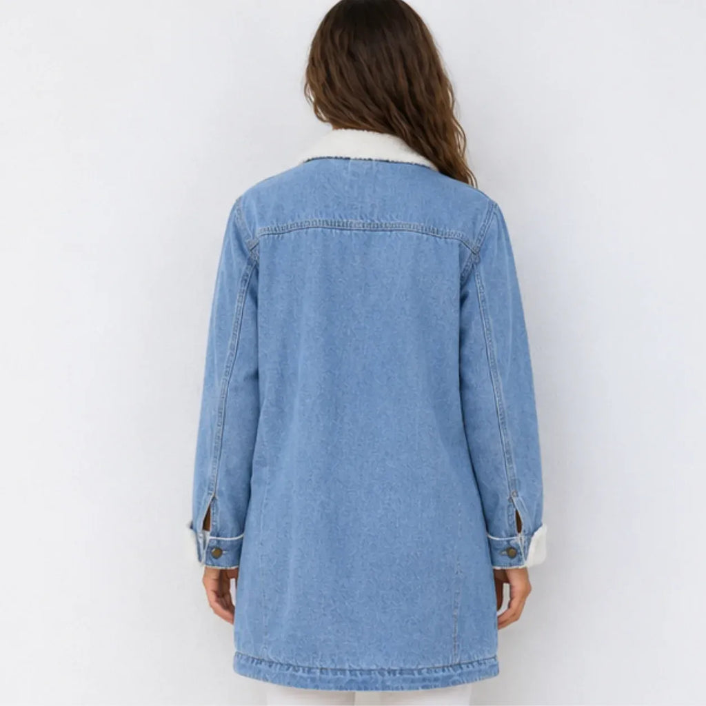 Back view of oversized blue denim jacket with sherpa-lined collar